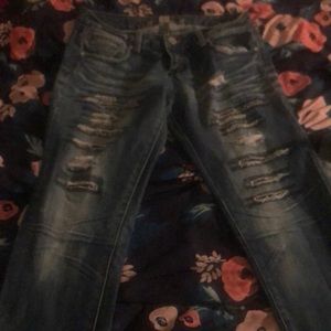 Dark ripped up jeans